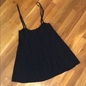 Black skirt with straps.